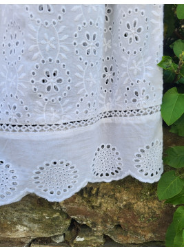 Blusa blanca sin mangas de algodón de mujer